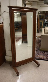 AN OAK FRAMED CHEVAL MIRROR, F