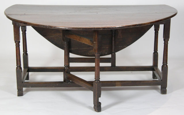 An oak gateleg table circa 1700