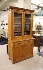 AN OAK KITCHEN CABINET ON CABI
