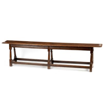 An oak long bench, late 17th