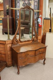 AN OAK LOW DRESSER WITH ATTACH