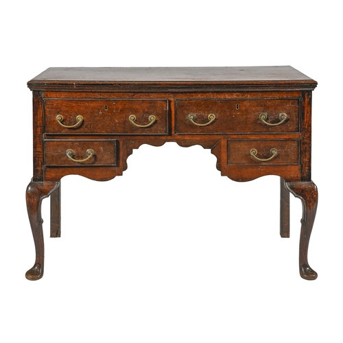 An oak lowboy, 19th c, fitted