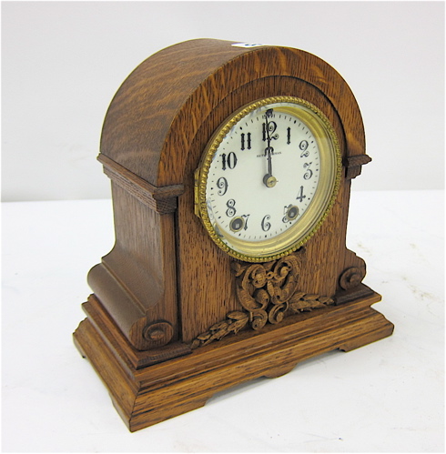 AN OAK MANTEL CLOCK Seth Thomas