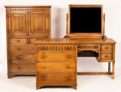An oak millinery cupboard