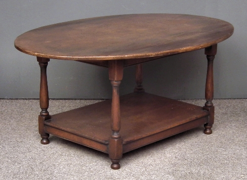 An oak oval coffee table of
