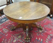 AN OAK PEDESTAL DINING TABLE W