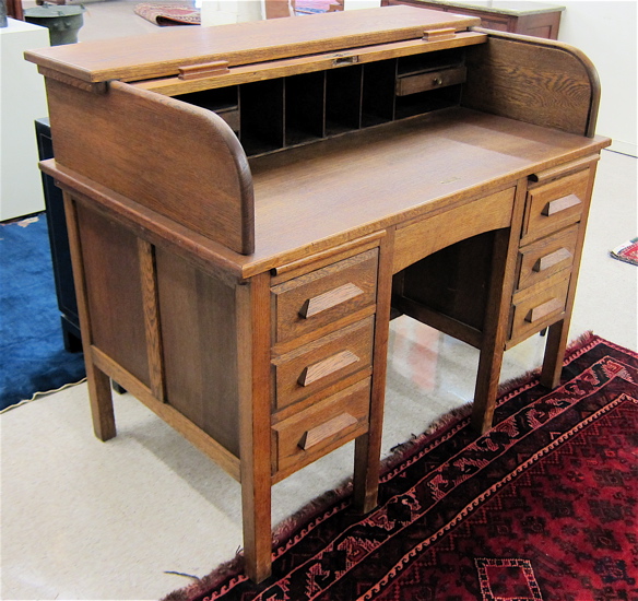 AN OAK ROLL-TOP DESK American early