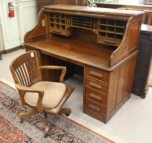 AN OAK ROLL-TOP DESK WITH CHAI