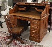 AN OAK ROLL-TOP DESK WITH CHAI