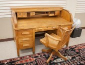 AN OAK ROLL-TOP DESK WITH CHAI