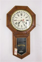 AN OAK SCHOOL HOUSE 'REGULATOR