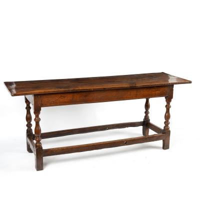 An oak serving table with two-plank