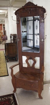 AN OAK SETTLE-BASE HALLSTANDAN