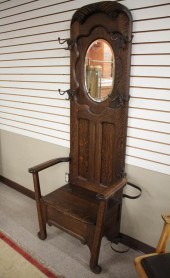 AN OAK SETTLE-BASE HALLSTANDAN