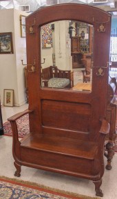 AN OAK SETTLE-BASE HALLSTANDAN