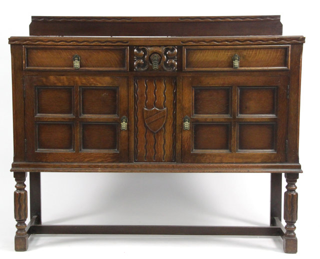 An oak sideboard fitted three