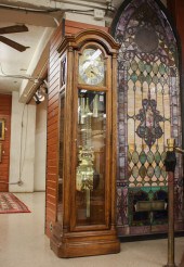 AN OAK TALL CASE FLOOR CLOCKAN