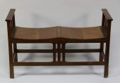 An oak two seat window-seat in
