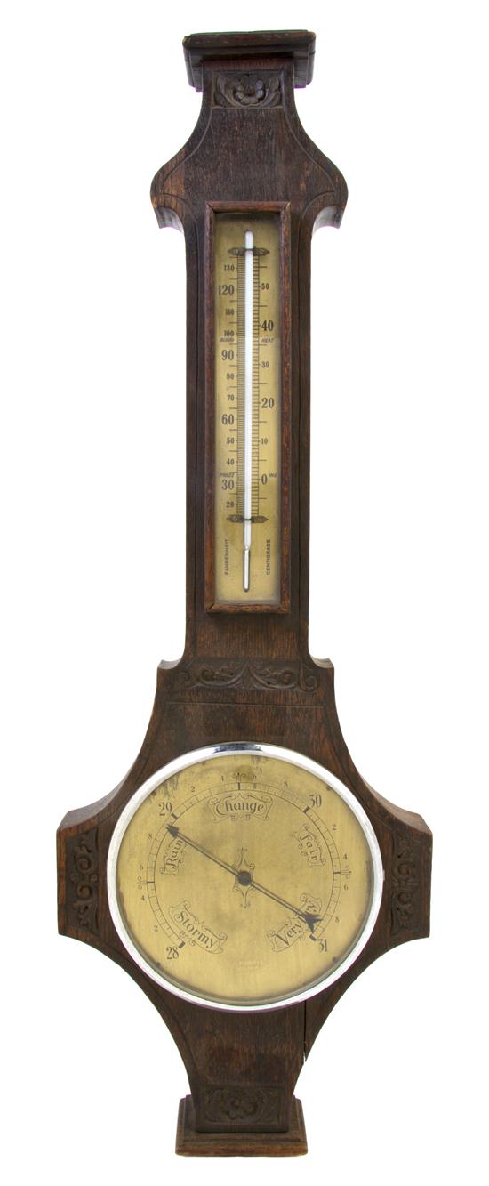 An Oak Wheel Barometer of typical