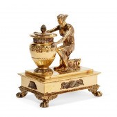 AN ODIOT SILVER GILT FIGURAL M