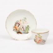 An ogee cup and saucer, circa