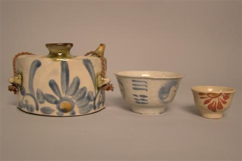 AN OKINAWAN HIP FLASK of curved