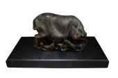 AN OLD CARVED SOAPSTONE FIGURI