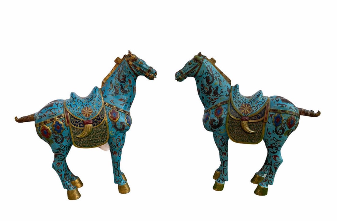 AN OLD PAIR OF CARVED WOODEN WITH