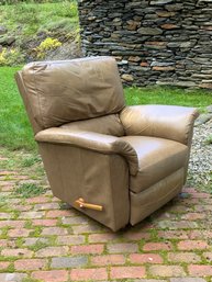 An olive colored leather La-Z-Boy