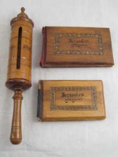 An olivewood Purim scroll hold
