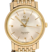 AN OMEGA 14K GOLD SEAMASTER DE