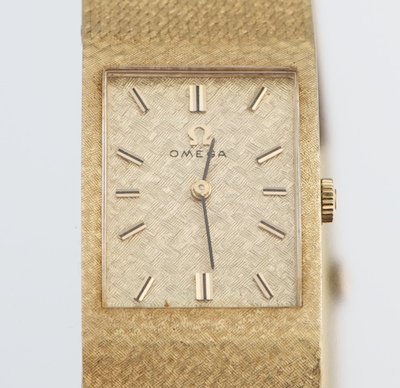 An Omega Gentleman's 14k Gold Wrist
