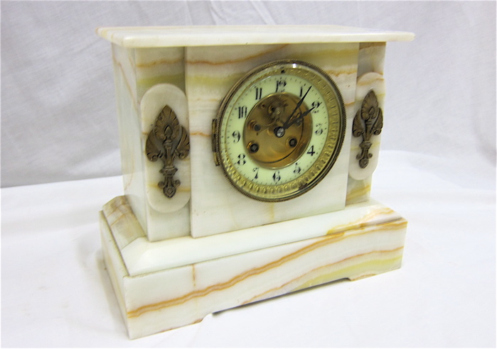 AN ONYX CASED MANTEL CLOCK Japy