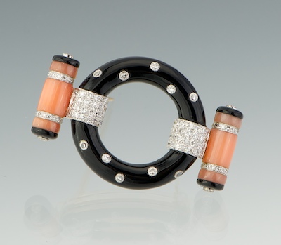 An Onyx Diamond and Coral Brooch