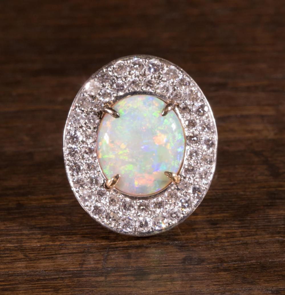 AN OPAL AND DIAMOND RINGAN OPAL AND