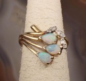 AN OPAL AND DIAMOND RINGAN OPA