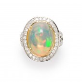AN OPAL, DIAMOND AND FOURTEEN