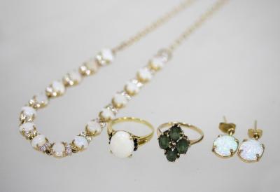 An opal dress ring set in 14ct