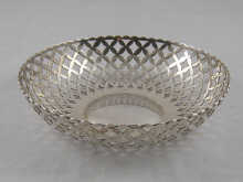 An open circular pierced silver