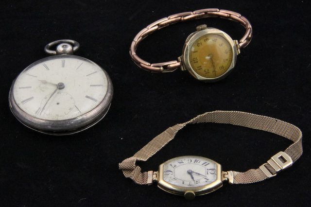 An open face pocket watch by John