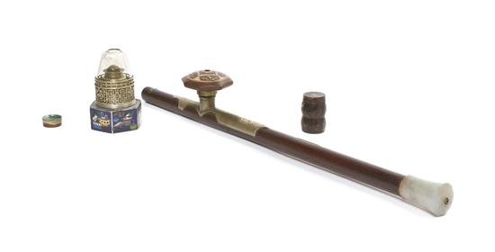 An Opium Pipe and Lantern the