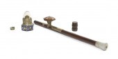 An Opium Pipe and Lantern the
