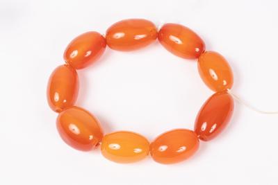 An orange agate bead bracelet of