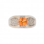 AN ORANGE GEMSTONE, DIAMOND AN