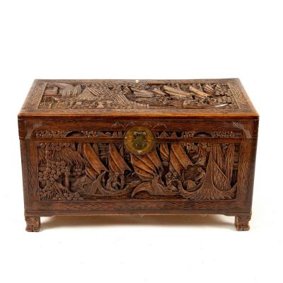 An Oriental carved camphorwood