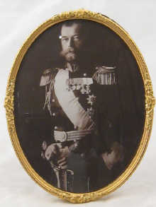 An ormolu oval picture frame