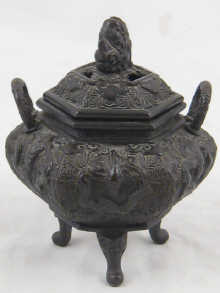 An ornate hexagonal bronze