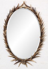 AN OVAL ANTLER FRAME MIRRORAn