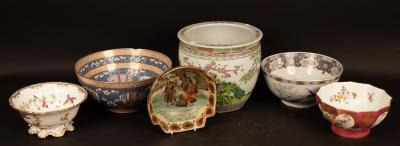 An oval bowl with serrated