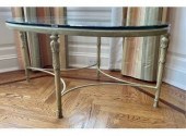 An oval coffee table with a be